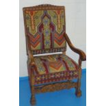 FLEMISH STYLE CARVED BEECH ARMCHAIR UPHOLSTERED IN TURKISH PATTERN FABRIC WITH CARVED SCROLL AND