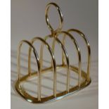 SILVER FOUR DIVISION TOAST RACK BY GOLDSMITHS & SILVERSMITHS CO LTD, LONDON 1912, H: 9 cm (98.3g)