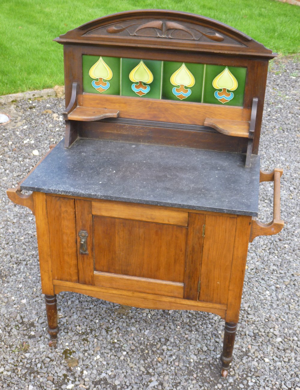 ARTS AND CRAFTS STAINED BEECH WASHSTAND WITH FOUR MULTI-COLOURED TILES