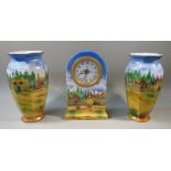 MERRIE ENGLAND N.H.P. MANTEL CLOCK TOGETHER WITH A PAIR OF VASES (VASE HEIGHT: 21 cm)