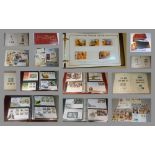 A STAMP COLLECTION CONTAINING A LARGE NUMBER OF FIRST DAY COVERS AND PRESENTATION SETS INCLUDING