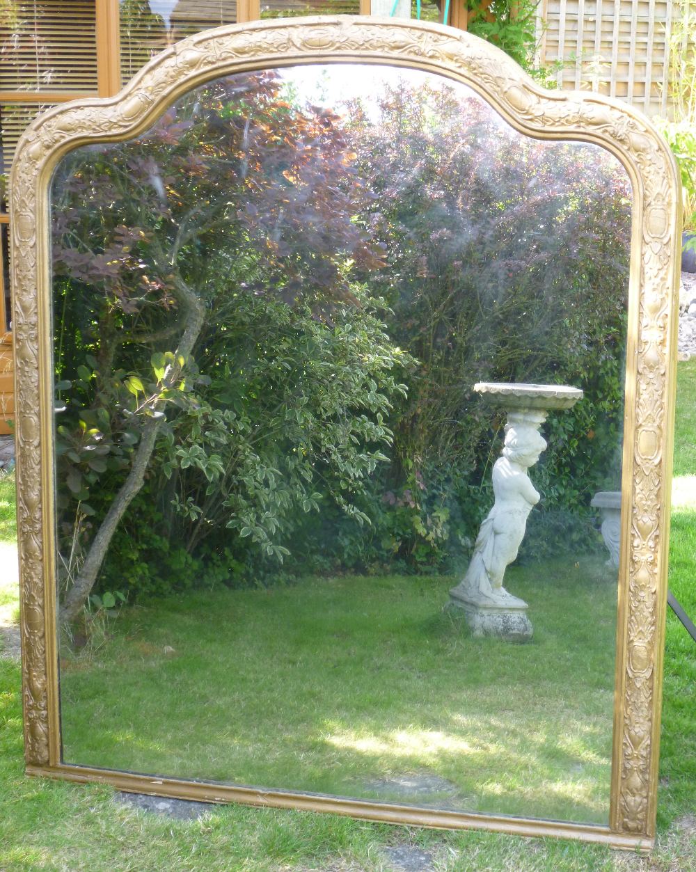 LATE C19th/EARLY C20th FRENCH OVERMANTLE MIRROR IN A GOLD PAINTED DECORATIVE FRAME (162 cm x 109 cm)