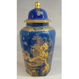 AN EDWARDIAN WILTON WARE HEXAGONAL VASE WITH GOLD CHINOISERIE DECORATION ON A BLUE MOTTLED GROUND,