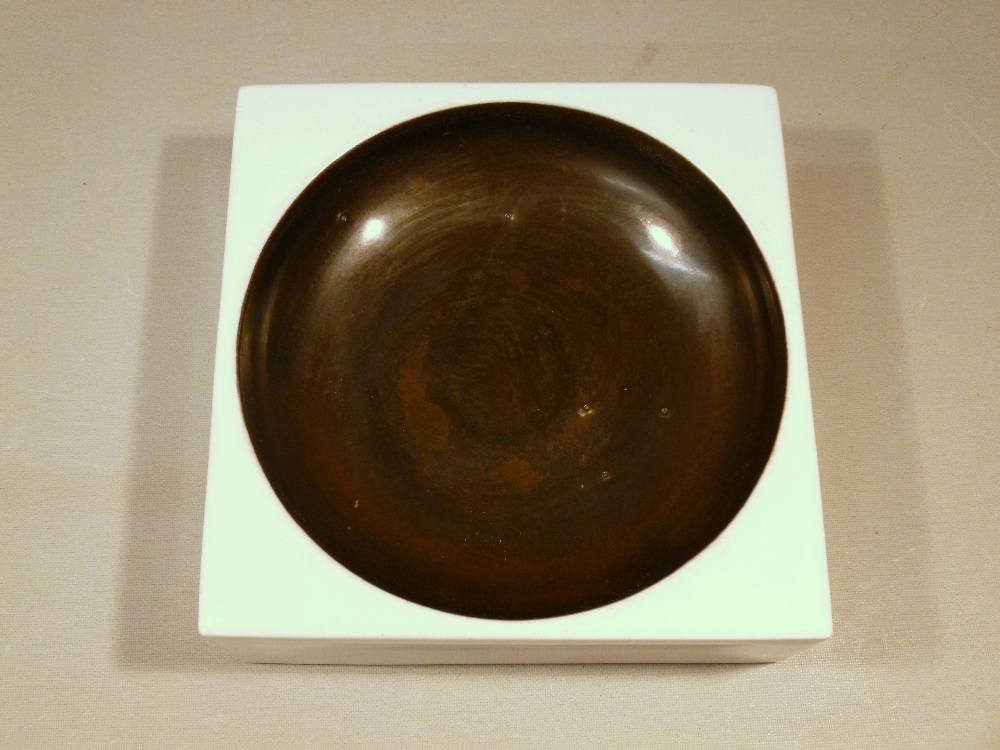 TROIKA POTTERY WHITE SQUARE ASHTRAY DECORATED BY ANN LEWIS WITH GLAZED CIRCULAR MOTIF, THE BASE WITH - Image 2 of 2