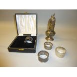 OCTAGONAL SILVER CASTER BY A.T., LONDON 1898 AND FOUR NAPKIN RINGS (197g)