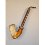 MEERSCHAUM PIPE WITH ROBED FIGURE DECORATION TO BOWL, WHITE METAL MOUNTS, WOODEN STEM AND TURNED
