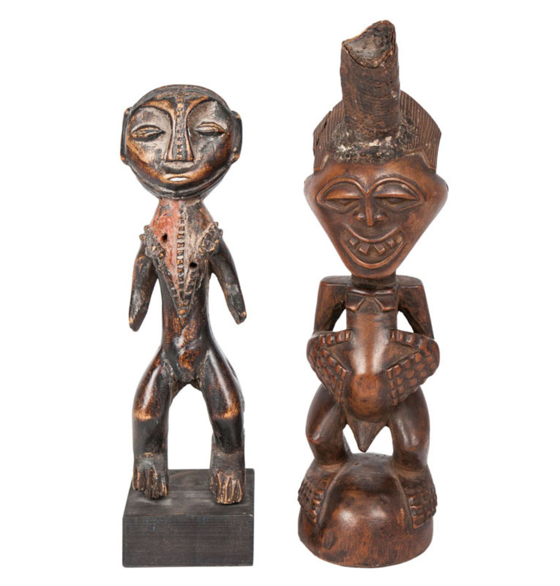 Two magic african figures West Africa. Carved wood, partially black coloured, traces of polychrome