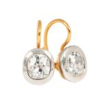 A pair of old cut diamond earrings 14 ct. roségold with silver. Hook shaped earrings each with one