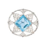 An Edwardian aquamarin diamond brooch Early 20th cent. Probably platinum. The aquamarine in princess