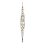 An Art-Déco diamond brooch Around 1920. 14 ct. yellow gold, platinised. Needle brooch with 14
