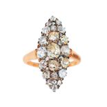 An antique marquise diamond ring Around 1900. 14 ct. redgold with silver. Navette shaped ring top