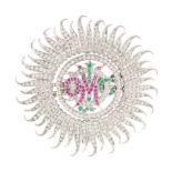A large Art-Déco diamond ruby emerald brooch Around 1930/40. Platinised. Flowershaped with rich
