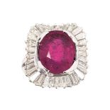 A ruby diamond ring 18 ct. white gold, marked. The oval ruby approx. 7,20 ct. (12,5 x 10 x 7,7 mm,