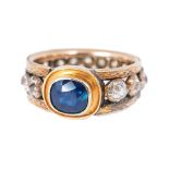 An antique sapphire diamond ring Around 1900. 14 ct. roségold and yellow gold. Around setting with