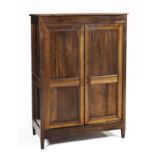 A CAPE STINKWOOD CUPBOARD, 19TH CENTURY the rectangular top above a pair of panelled doors enclosing
