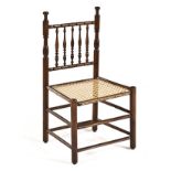 A CAPE TEAK TOLLETJIES CHAIR, 19TH CENTURY the turned top and bottom rail joined by turned spindles,