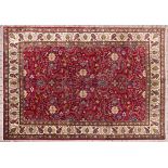 A TABRIZ CARPET, NORTH WEST, PERSIA, MODERN the blue field with a red and ivory stylised floral
