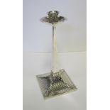 AN EDWARDIAN SILVER ARTS AND CRAFTS CANDLESTICK, JAMES DIXON & SONS LTD, SHEFFIELD, 1909 the