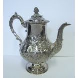 A WILLIAM IV SILVER COFFEE POT, HENRY WILKINSON & CO, SHEFFIELD, 1834 the baluster body chased