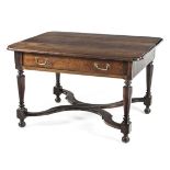 A CAPE STINKWOOD PEG-TOP TABLE, EARLY 19TH CENTURY the moulded shaped rectangular top above a long