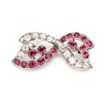 A DIAMOND AND RUBY BROOCH in the form of a bow, embellished with oval mixed-cut rubies and old-