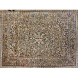 A KESHAN CARPET, PERSIA, MODERN the pale green field with a floral star medallion, ivory