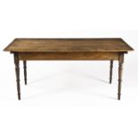 A CAPE YELLOWWOOD AND STINKWOOD PEG-TOP KITCHEN TABLE, 19TH CENTURY the rectangular top above a