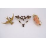 A MISCELLANEOUS GROUP OF BROOCHES of various sizes and designs, comprising: a 15ct gold and seed