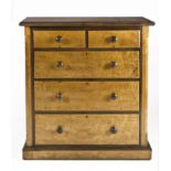 A CAPE STINKWOOD AND YELLOWWOOD CHEST OF DRAWERS the rectangular top above a pair of short