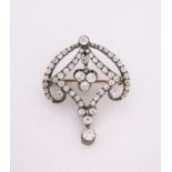 A VICTORIAN DIAMOND BROOCH/PENDANT of geometric design, set throughout with old-cut diamonds, in