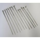 A SET OF TWELVE SILVER MEAT SKEWERS, APPARENTLY UNMARKED in sizes, 148g in total 12