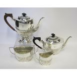 A VICTORIAN SILVER FOUR-PIECE TEA AND COFFEE SET, BARKER BROTHERS, BIRMINGHAM, 1897 AND 1899