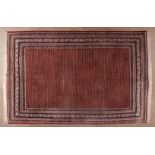 A MIR CARPET, WEST PERSIA, MODERN the red field with an overall small boteh pattern depicted in