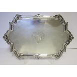 A DUTCH SILVER TRAY, 1859 the shaped rectangular body with a reeded, scroll and shell rim,