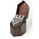 A GEORGIAN FLAME MAHOGANY CUTLERY BOX the serpentine front with a sloped hinged cover, the