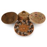 FOUR ZULU IMBENGE three with woven decoration, one with beaded rim and surface decoration 4