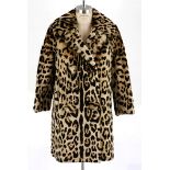 A Vintage Woman's Ocelot fur coat.  NOT SUITABLE FOR EXPORT Mid length. 82cm from the nape of the
