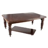 A Victorian mahogany extending dining table, 19th century the moulded edge with rounded corners