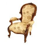 A Victorian walnut Grandfather chair, second half 19th century the spoon-shaped back with an