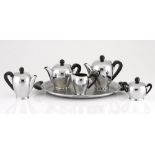 An Alfra Alessi 'Bombé' stainless steel tea and coffee service, designed 1945, Italy comprising: a