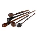 FOUR ZULU CARVED WOODEN SPOONS the longest 40cm long 5