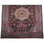 A Khorossan Carpet, E. Persia, Modern the deep indigo blue field with an ivory and similar floral