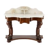 A Victorian marble-topped and mahogany console table the shaped top with an open shelf and a
