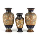 A pair of Doulton Lambeth vases, early 20th century each baluster-shaped body painted with foliate