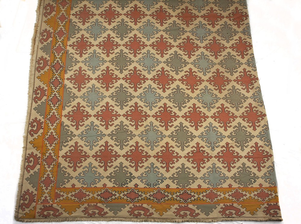 An European flat weave Carpet, Portugal, Modern the ivory field with an overall design of