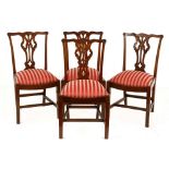 A set of four Chippendale style mahogany dining chairs, 19th century each with a shaped top rail