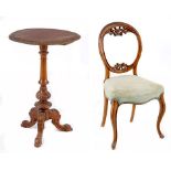A Victorian walnut balloon-back chair, late 19th century the oval back with pierced detail, stuff-