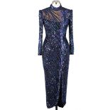 A Bob Mackie Vintage beaded evening gown.  Full length gown, long sleeves. Peacock colour beading in