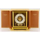 A BRASS ATMOS CLOCK, JAEGER LECOULTRE MID 20TH CENTURY the 10,5cm chapter ring with gilt Arabic