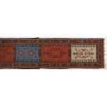 A Kurd Flat Weave Runner, N.W. Persia, Modern the field divided into five panels depicted in red,
